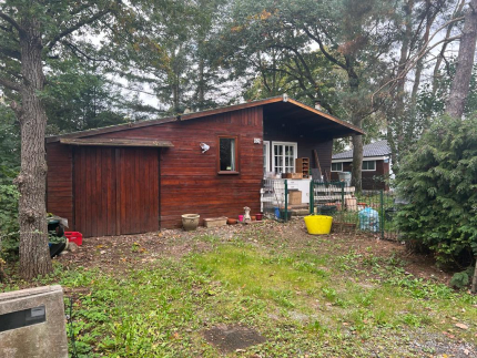 Chalet 2 chambres avec jardin et garage.